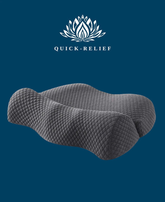 A double neck support pillow with a textured surface, primarily in gray color, displayed against a blue background with the 'Quick-Relief' brand logo in the top left corner.